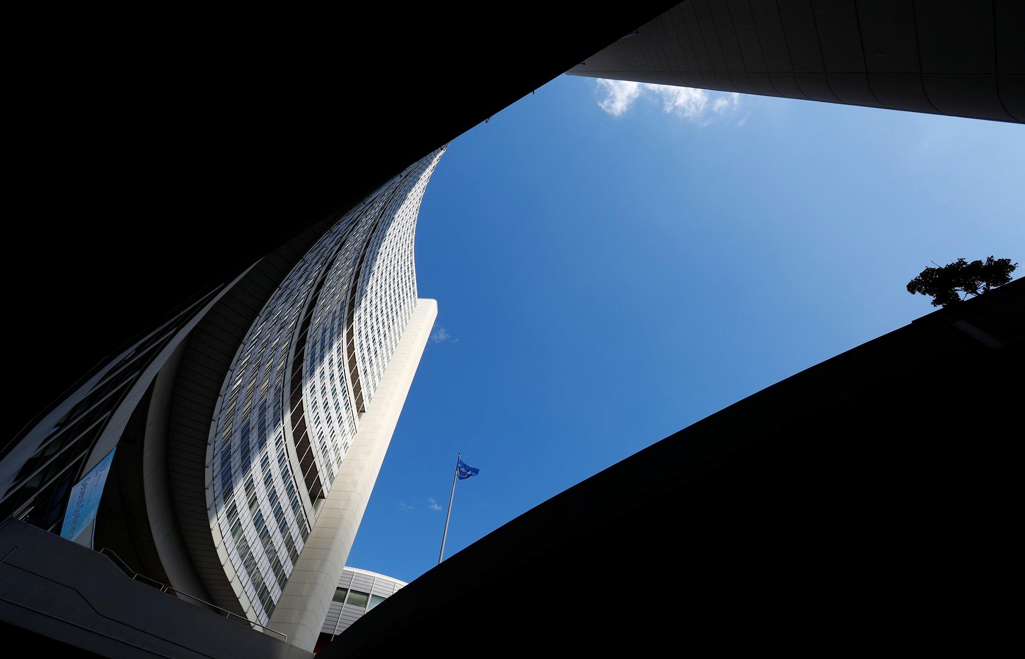 IAEA flag flies in front of their headquarters during the General Conference in Vienna, Austria, on September 18, 2017