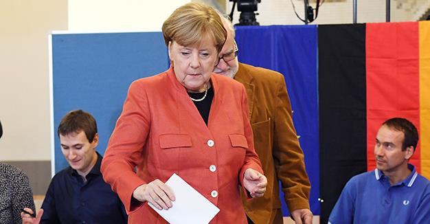 German Chancellor Angela Merkel won a fourth term in office on Sunday