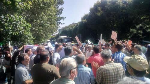 Protesters in Tehran, Iran, demanding their investments returned