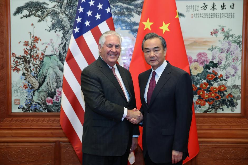 U.S. Secretary of State Rex Tillerson (L) shakes hands with Chinese Foreign Minister Wang Yi (R) before their meeting at the Great Hall of the People on September 30, 2017 in Beijing, China.