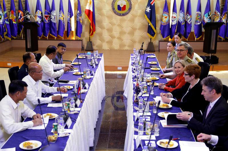 Australian Defense Minister Marise Payne and her staff meet her Filipino counterpart Delfin Lorenzana and other Philippine defense officials during their meeting to discuss military strategy and assistance in the Philippines' fight against Islamist militants in Marawi, at Villamor Air Base in Pasay, Metro Manila, Philippines, September 8, 2017