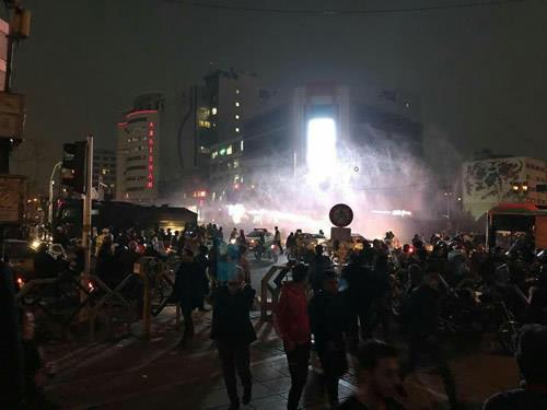 Anti-government protesters demonstrated in Iran on Sunday in defiance of a warning by the authorities of a tough crackdown.