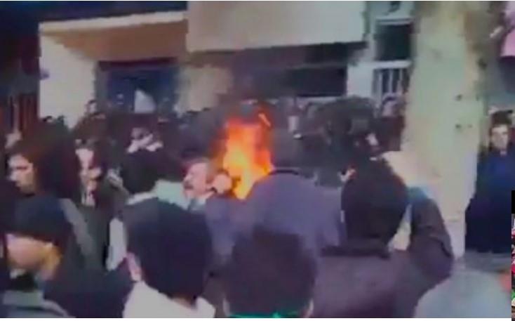 Protestors in Tehran, Iran come up against police as the uprising enters its seventh day