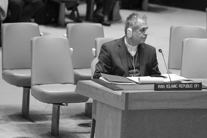 Javad Safaei, left, member of the Iranian delegation, listens as United States Ambassador to the United Nations Nikki Haley speaks during a Security Council meeting on the situation in Iran, Friday, Jan. 5, 2018.