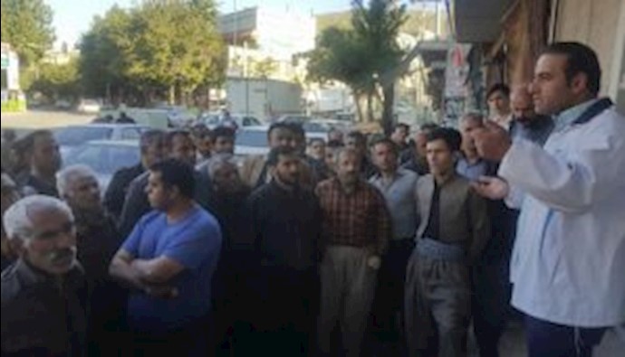 A group of workers gathered in the Shabrang Square of Marivan City