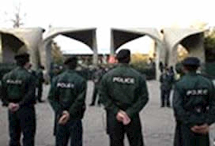 Tehran University students face detectors at the gates Tehran University students face detectors at the gates