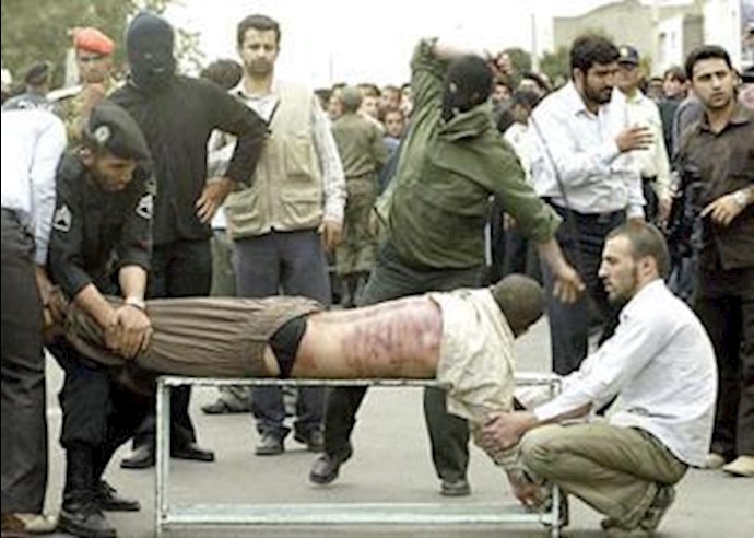 Iranian whipped in public for drinking alcohol Iranian whipped in public for drinking alcohol