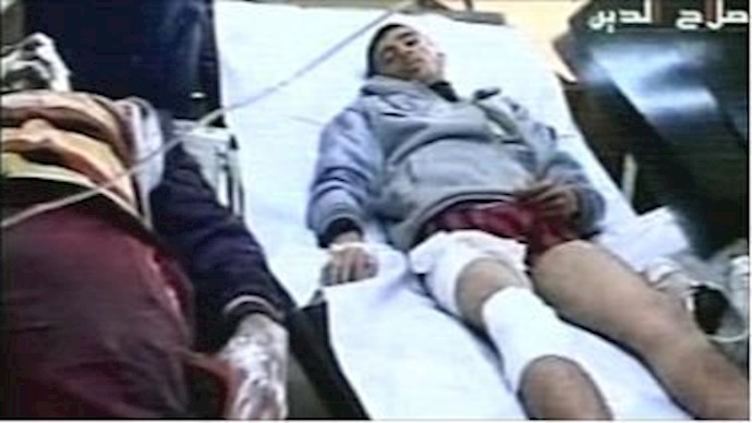 At least 65 die in attack at recruitment center in northern Iraq