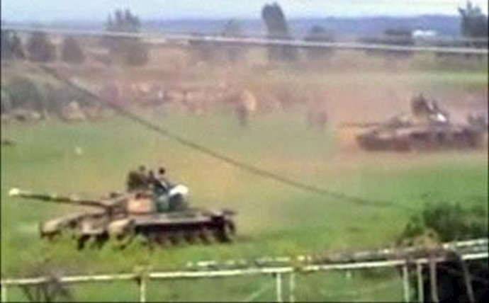 Syrian tanks deploy in flashpoint city