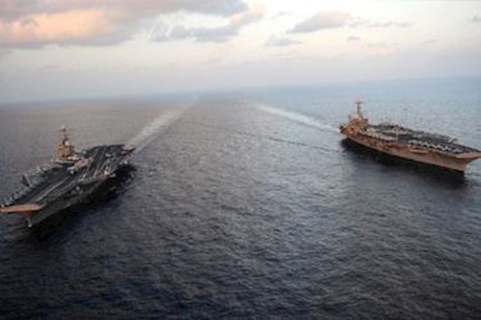 West sends Iran warning with warship deployment