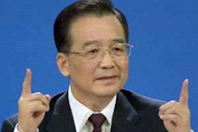 China leader warns Iran not to make nuclear arms