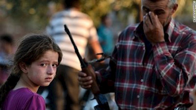 Children in a war-torn Syrian town hold school in a cave