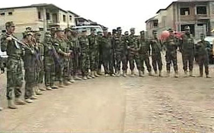 Kurdish fighters gather in disputed Iraqi area, defying Baghdad decision to send extra forces