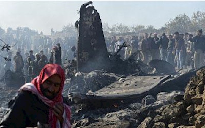 Syrian villagers cheer downed jet; rebels display captured missiles