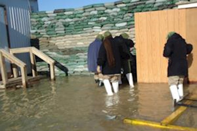 Iraqi intelligence agents prevent drainage of water and sewage from Camp Liberty after heavy rainfall