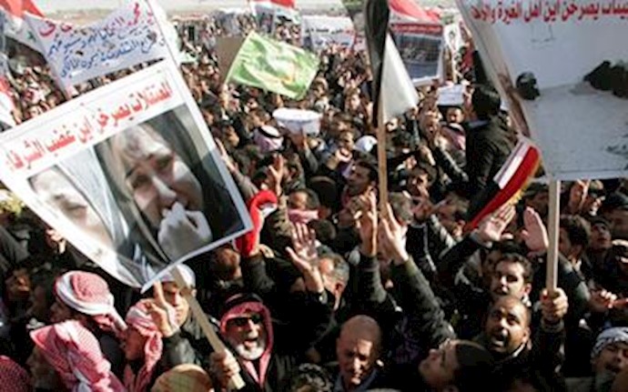 Protesters block key Iraq highway, Maliki slams demos