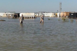 Liberty engulfed in sewage and rain water, residents demand to return to Ashraf