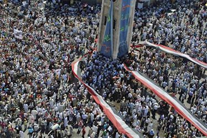 Syria protesters defy crackdown to mark massacre