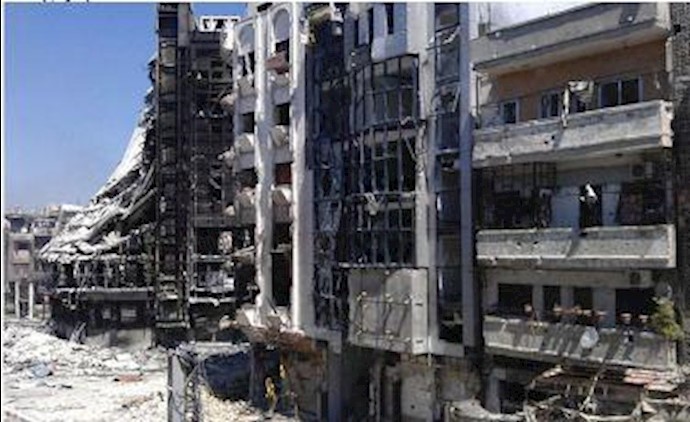 Syrian forces pound Homs hours ahead of U.N. observer team’s arrival