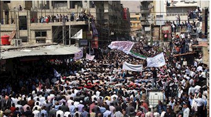 Syrian troops storm Damascus suburb, activists report