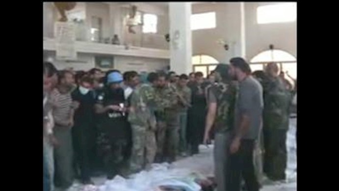 Syrian government claims ’tsunami of lies’ surrounding Houla massacre