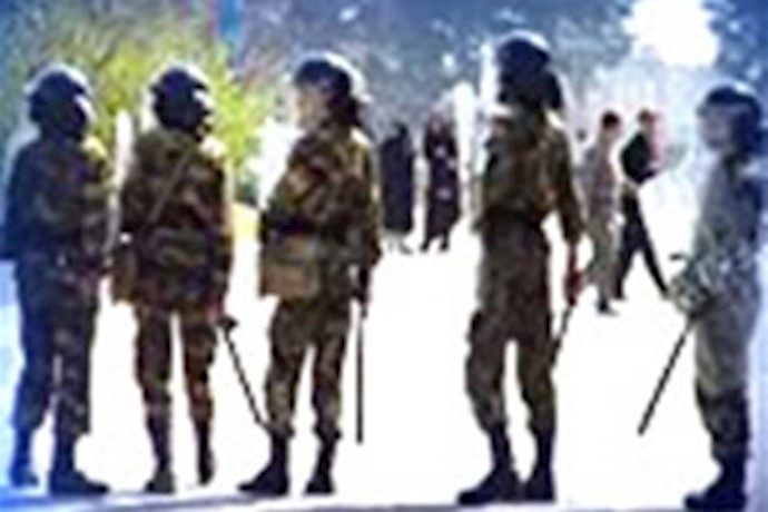 Security forces shot two passengers of a car to death