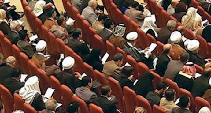 Iraq MPs vote to bar Maliki from third term