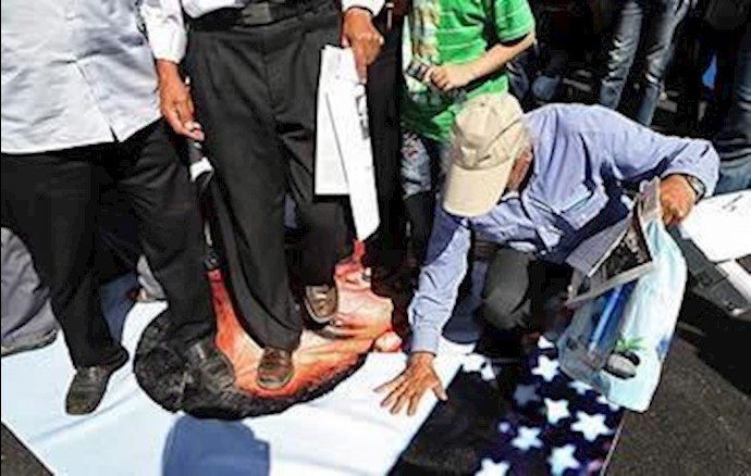 Tehran Friday prayers: torching US flag, Obama pictures