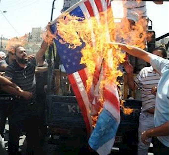 Tehran – regime’s agents set US flag ablaze