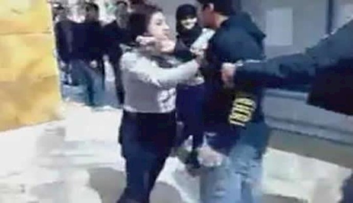 Tehran: A female student vs. a Basij militant