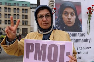 Exile Iranians supporters of the PMOI demonstrate in Germany against the execution of Reyhaneh Jabbari