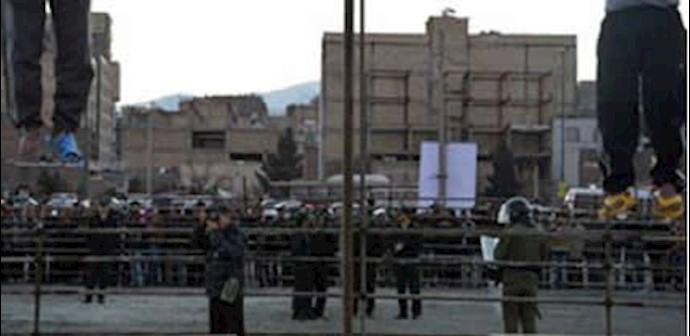 Two men hanged in public in the city of Karaj