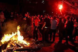 Iranians rushing to Fire Festivities & protesting mullahs’ rule