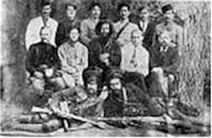  'Mirza Kouchek Khan(center) among Jungle fighters'
