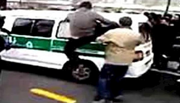  'Brave Iranians attacking police vehicle [File Photo]'