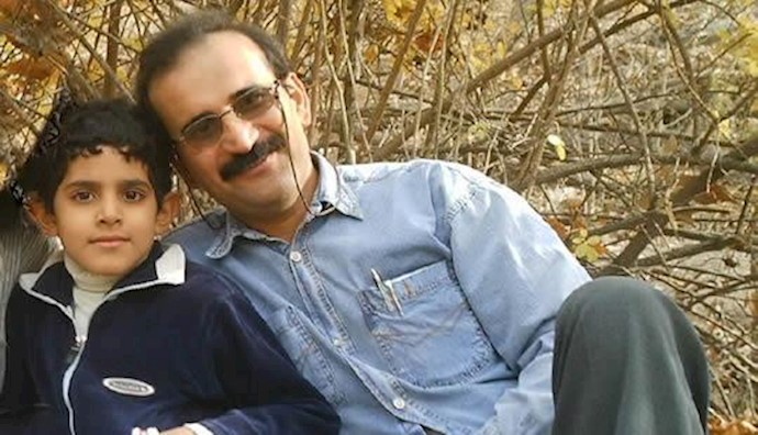  'Gholam-Reza Khosrawi and his son'