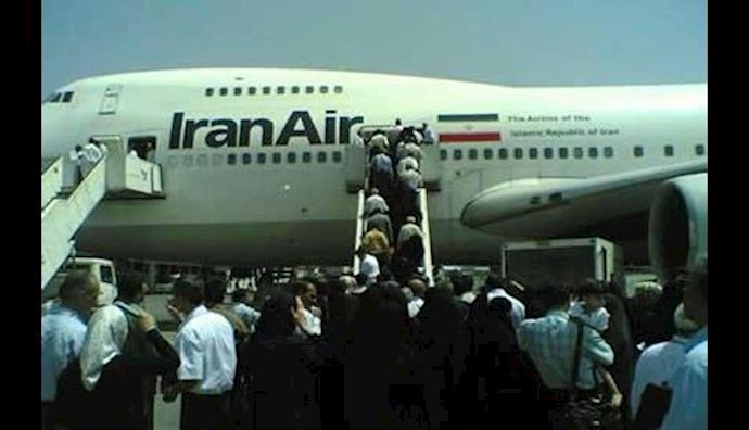 Group of Iran Air workers on strike in Tehran’s Mehr Abad Airport