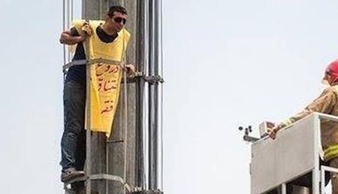  'Man attempting to commit suicide in Tehran'