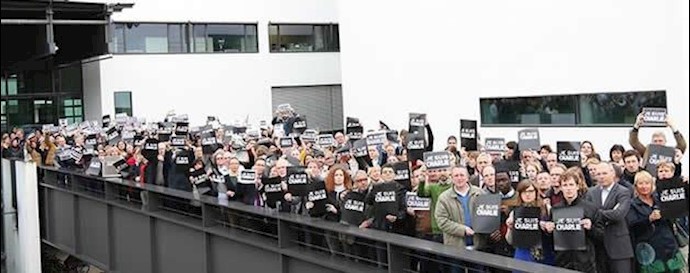 Crowds gather for historic Paris march of defiance and sorrow
