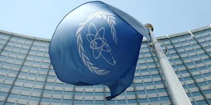  'The flag of the International Atomic Energy Agency (IAEA) flies in front of its headquarters in Vienna, Austria'