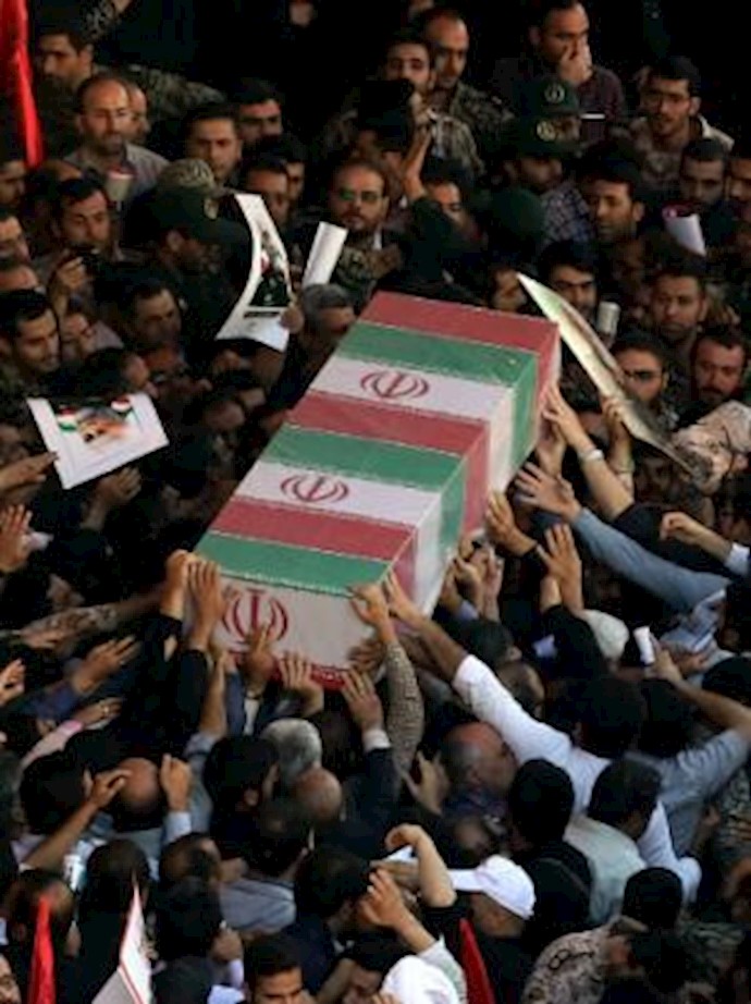 As Iranian deaths in Syria rise, dispute opens at home