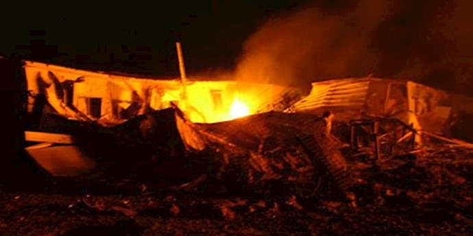  'Photo published by the MEK of the aftermath of Thursdays rocket attack on their camp near Baghdad airport.'