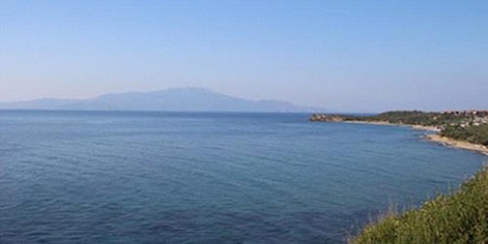  'The island of Lesbos, as seen from the Turkish coastal town of Kucukkuyu '