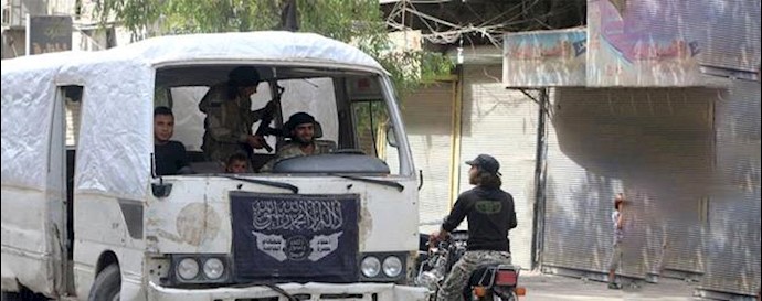  'Free Syria Army fighters ride a bus in Aleppo, Syria'