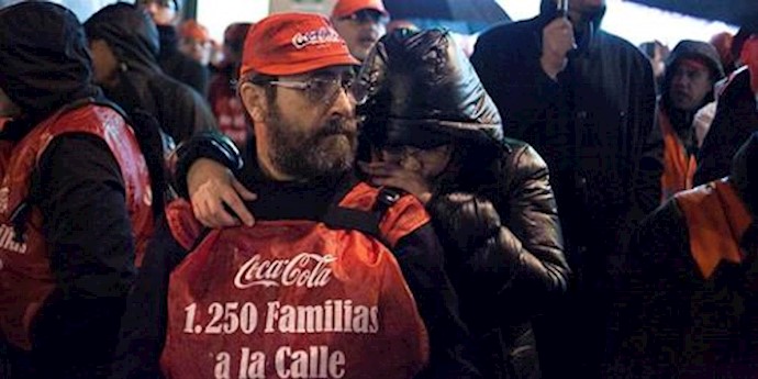Spanish workers celebrate victory over Coca-Cola
