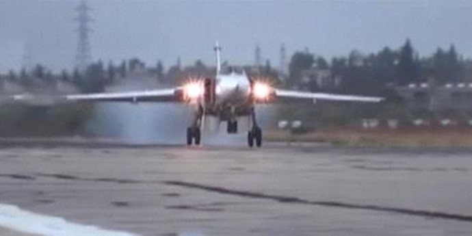 Syria activists report intense Russian and government airstrikes in Homs, 4 civilians killed