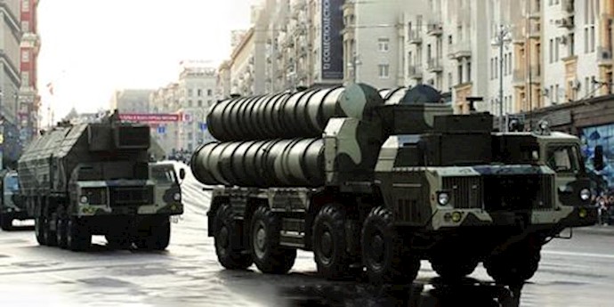  'Russian S-300 anti-missile rocket system move along a central street during a rehearsal for a military parade in Moscow'