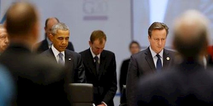  'Leaders of the G20 stand in a moment of silence for victims of terrorism, including the attacks in Paris'