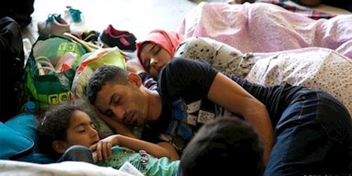  'Syrian refugees stranded as they wait to be allowed to cross in to Europe '