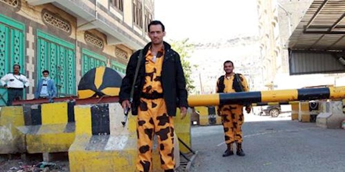  'Yemeni soldiers stand guard at the entrance gate of the United Nations buildings on February 22, 2015, in the capital Sanaa '